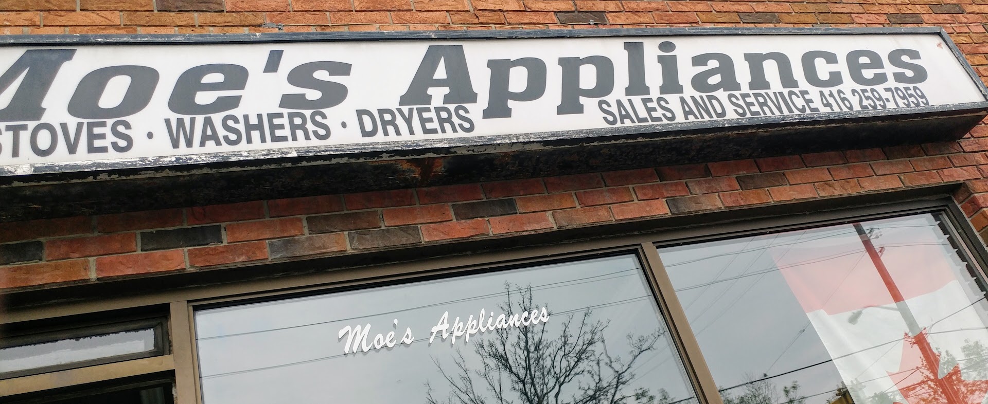 Moe's Appliances sign — sales and service, 416 259-7959