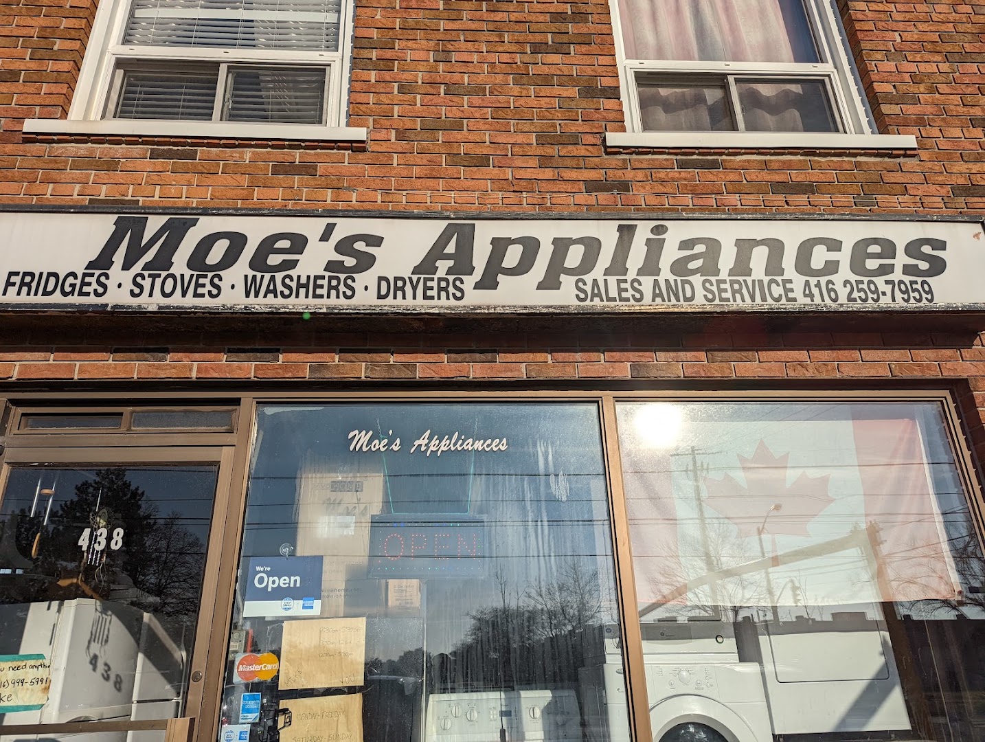 Moe's Appliances storefront on Horner Ave with washers and dryers in the window